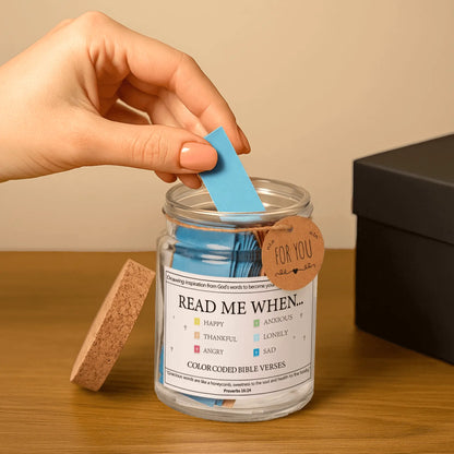 Hand pulling out a blue scroll from the Handmade Bible Verses Jar labeled for “sad” moments, highlighting the ease of use and personal encouragement found in this Scripture-filled Christian gift.